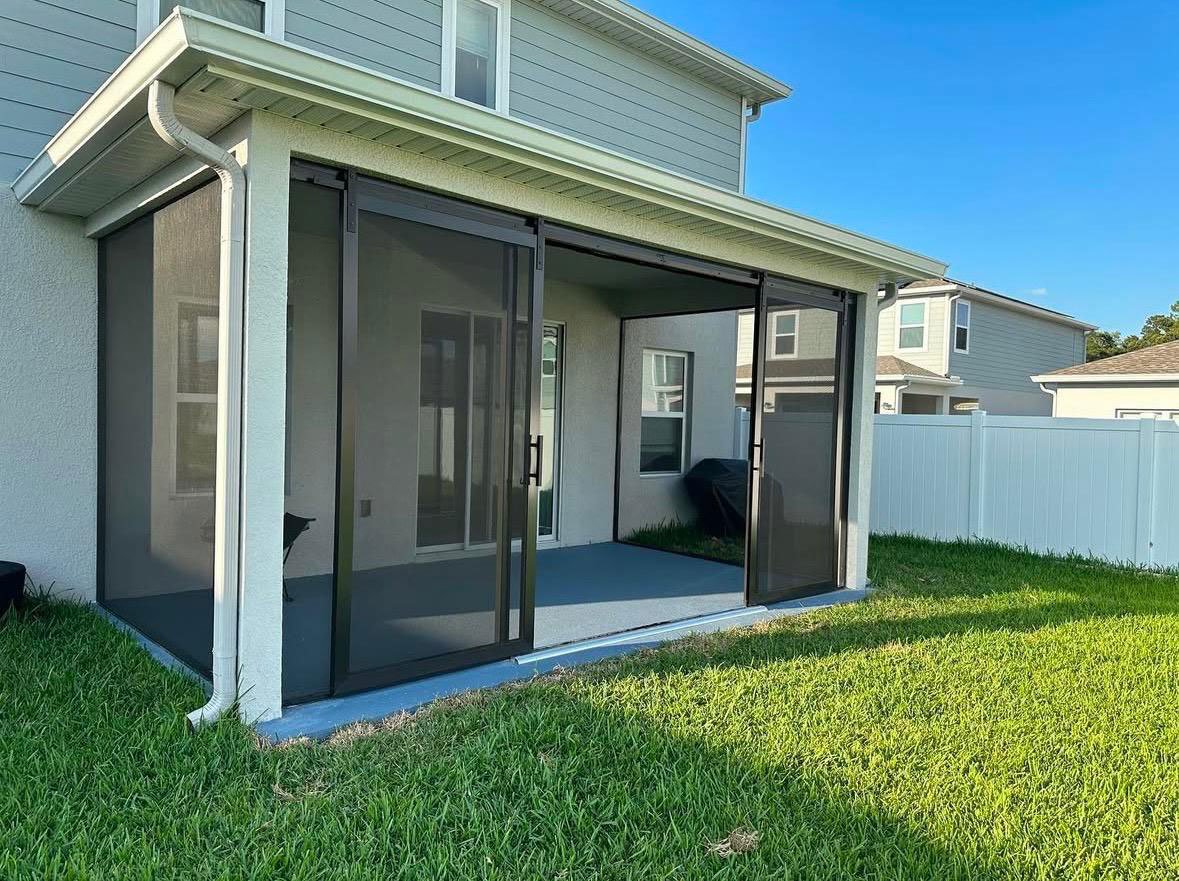 Gutters and screens combo in a houses patio